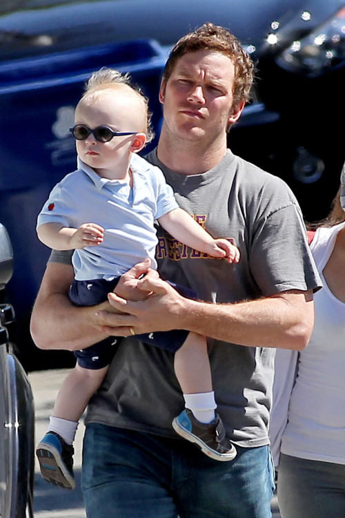 EXCLUSIVE: Chris Pratt carries his sunglasses-wearing 2 year old son Jack into a birthday party in Beverly Hills